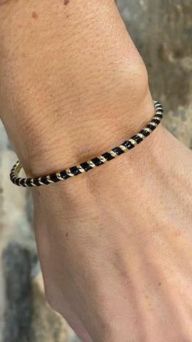 Bracelet jonc or et noir