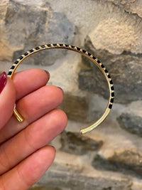 Bracelet jonc or et noir